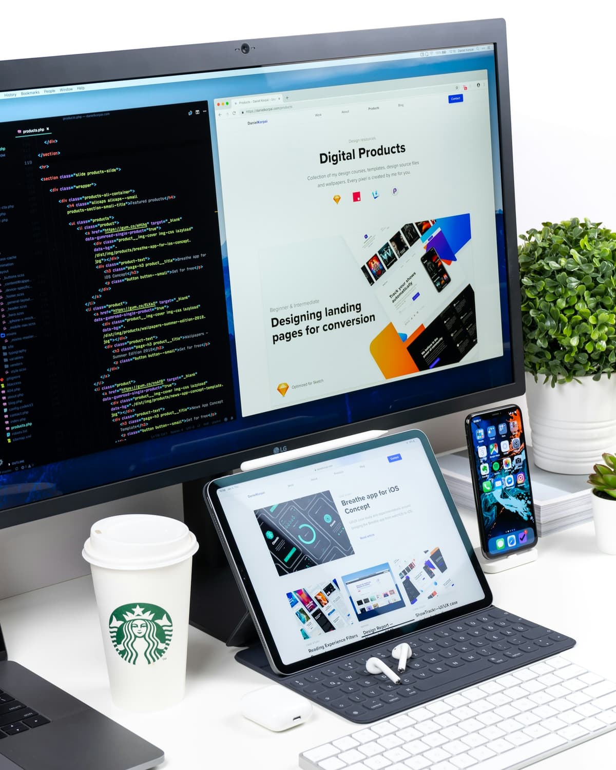 Web designer reviewing a modern website layout on a desktop, comparing platform choices for Indian businesses